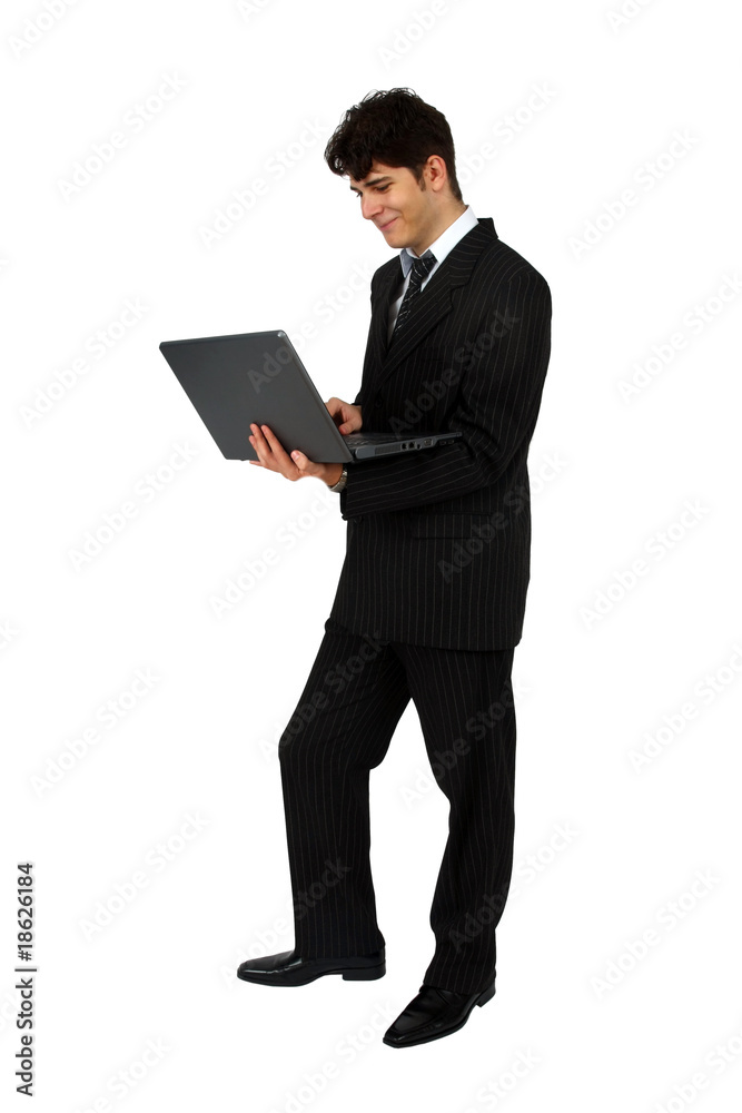 Successful business man working with laptop isolated Successful business man working with laptop isolated