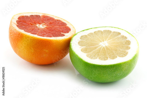 Two Ripe Sliced Grapefruits Isolated