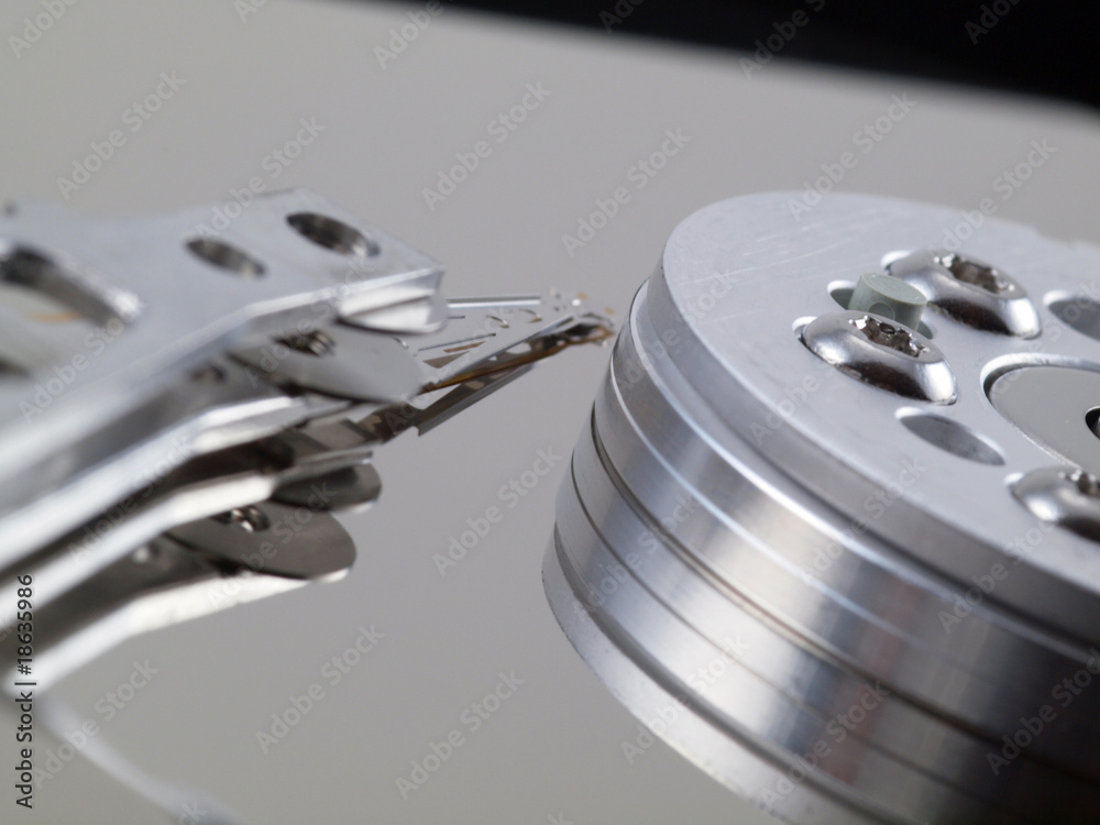 Hard Drive platter and head on right side Hard Drive platter and head on right side
