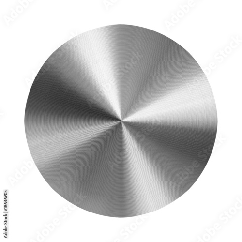 turned metal disc on isolated white background