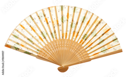 Closeup of wooden fan isolated on white.
