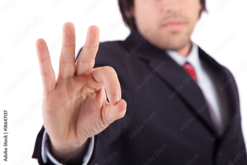 Business man signaling ok Business man signaling ok