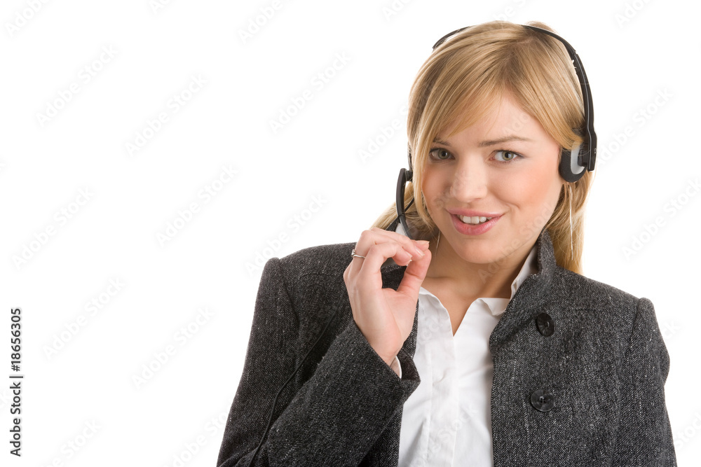 Friendly telephone operator wearing headset Friendly telephone operator wearing headset