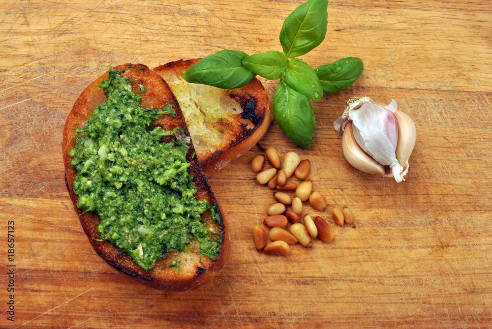 baguette as a snack with homemade fresh pesto baguette as a snack with homemade fresh pesto
