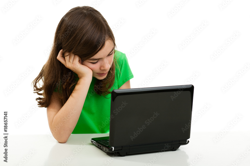 Girl using laptop isolated on white background Girl using laptop isolated on white background