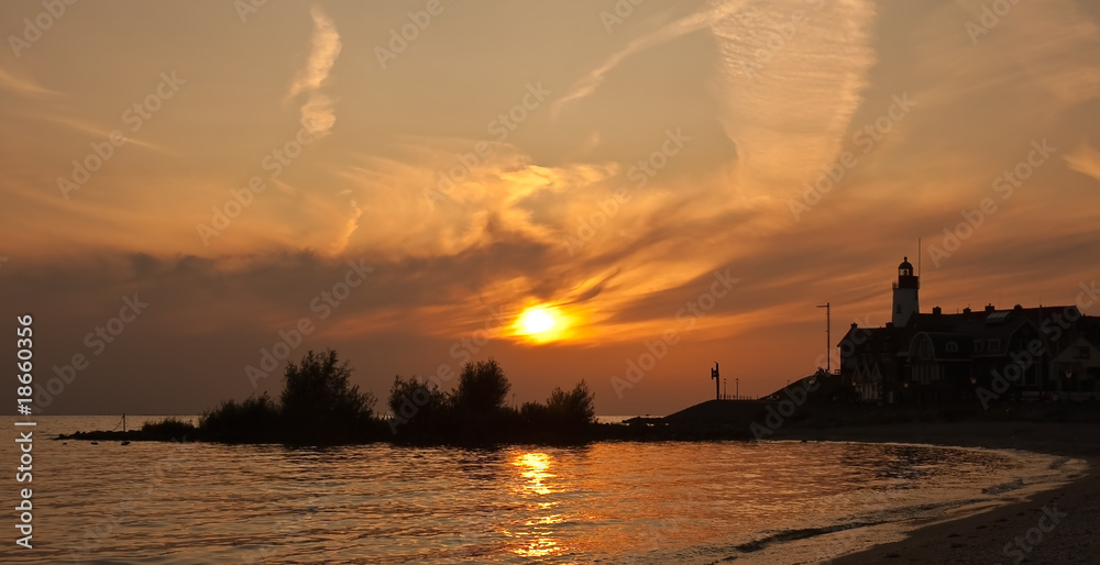 Beautiful sunset in the fishing village Urk, the Netherlands - obrazy, fototapety, plakaty 