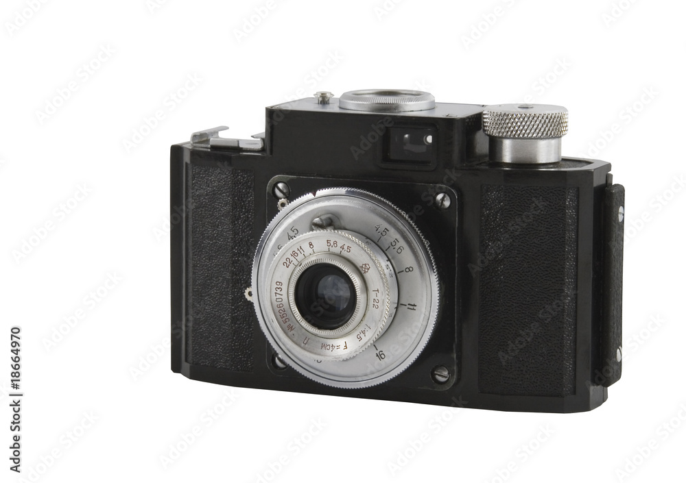 Old photographic camera isolated over white