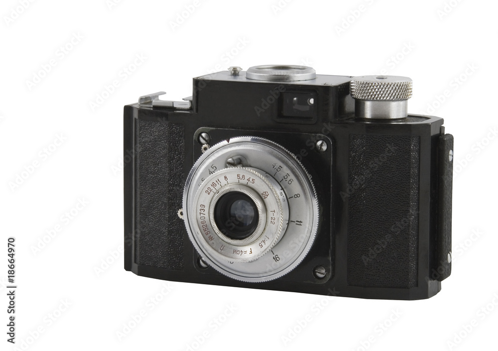 Old photographic camera isolated over white Old photographic camera isolated over white