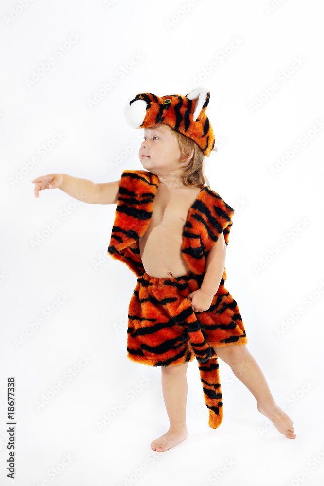 The lovely child in a suit of a tiger The lovely child in a suit of a tiger