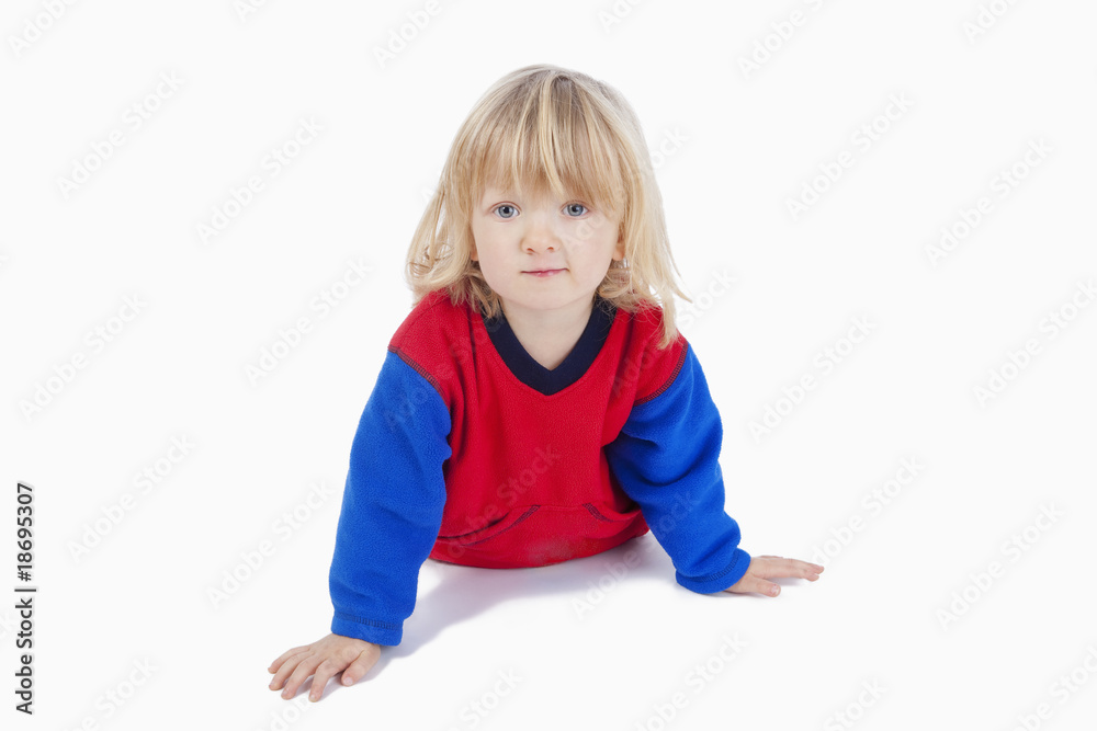 boy lying down, looking at camera boy lying down, looking at camera