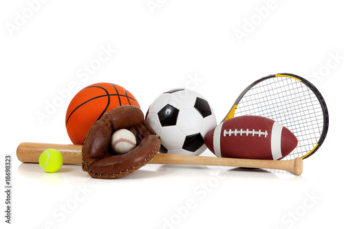 Assorted sports equipment on white photo