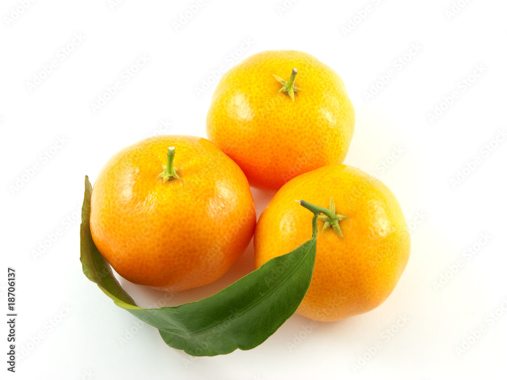 Three mandarin with leaf isolated on white background Three mandarin with leaf isolated on white background