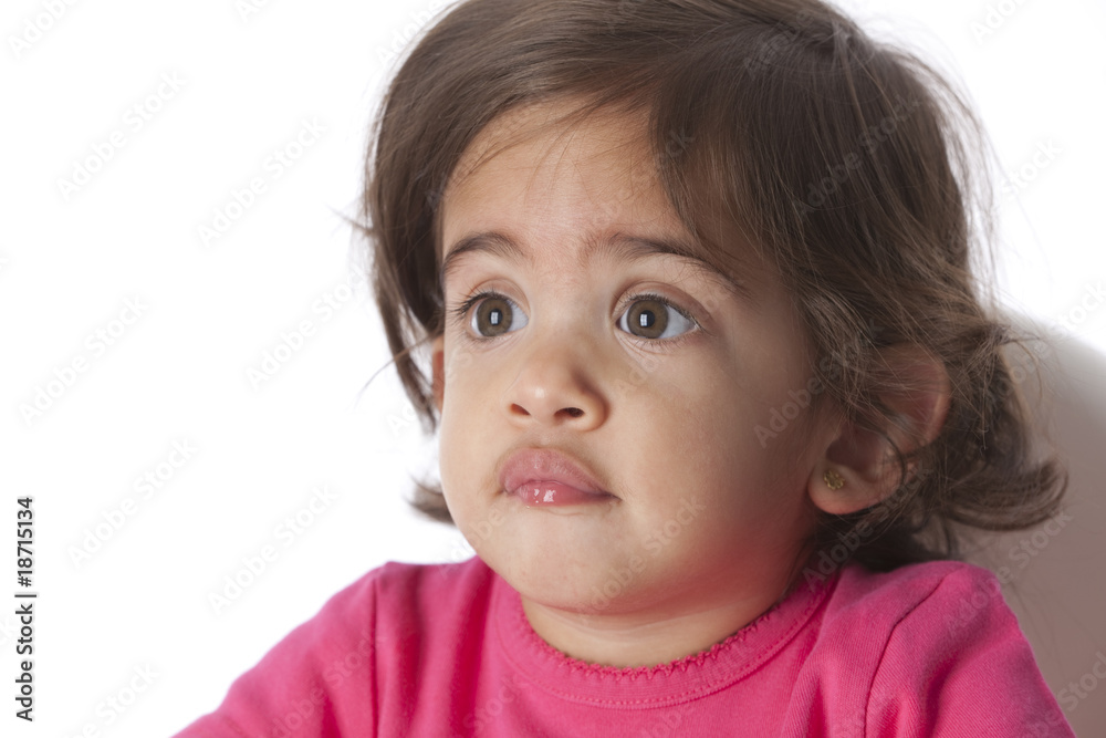 Portrait of a baby girl with a sad expression Portrait of a baby girl with a sad expression