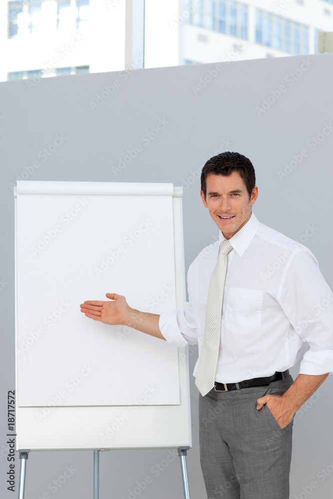Attractive businessman giving a presentation Attractive businessman giving a presentation