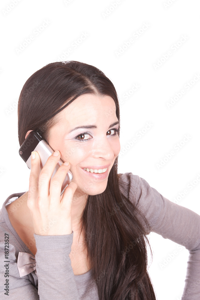 An attractive young woman with mobile phone An attractive young woman with mobile phone