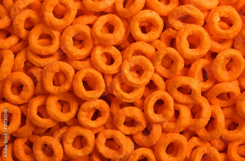 Tableau sur toile cheese ring tidbit cracker close up as background