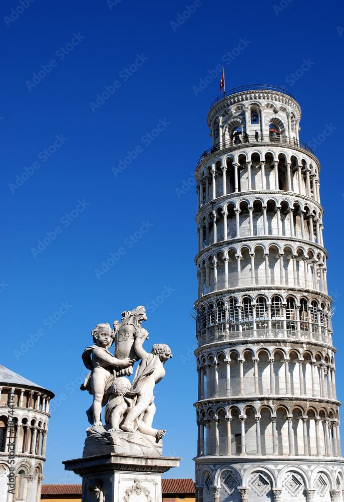 Leaning Pisa tower and statue