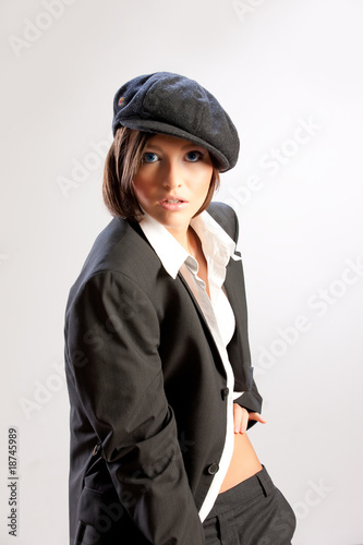Young Beautiful Woman In Men's Suit