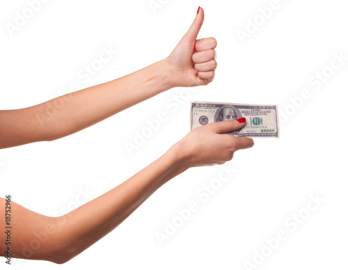 Woman's hands and dollars