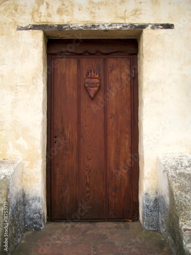 Wooden door of the Carmel Mission photo