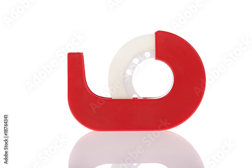 Clear tape dispenser isolated on a white background