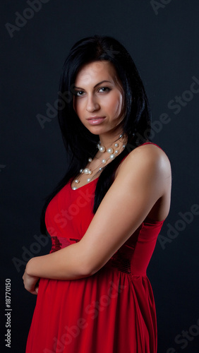 Picture of sexy brunette in red dress