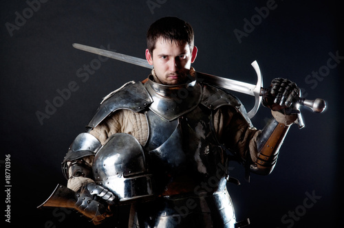 Fotografia, Obraz Great knight holding his sword and helmet