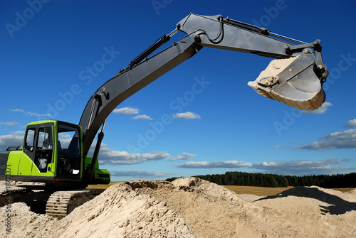 Excavator loader in sandpit