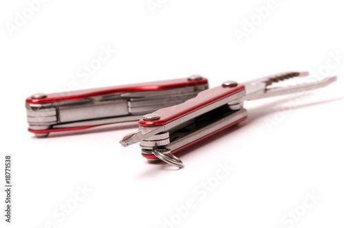 Picture of multitool (isolated on white) photo