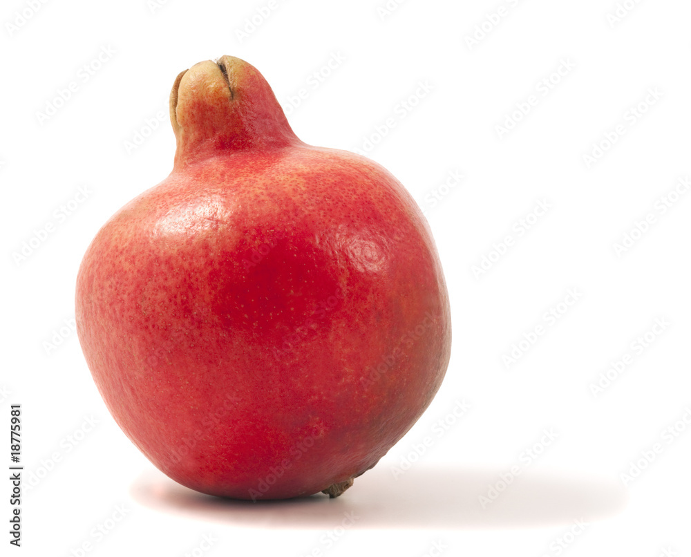 Fresh pomegranate isolated on white background. Macro photo. Fresh pomegranate isolated on white background. Macro photo.