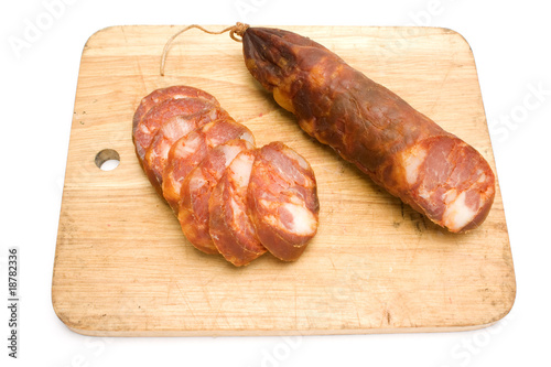 One Smoked pork sausage, portuguese chouriço photo