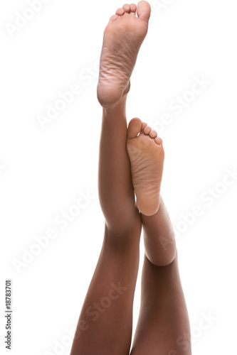 slender legs and feet of African-American woman Stock Photo | Adobe Stock