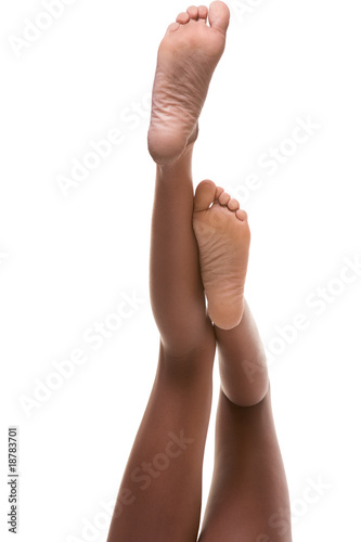 slender legs and feet of African-American woman