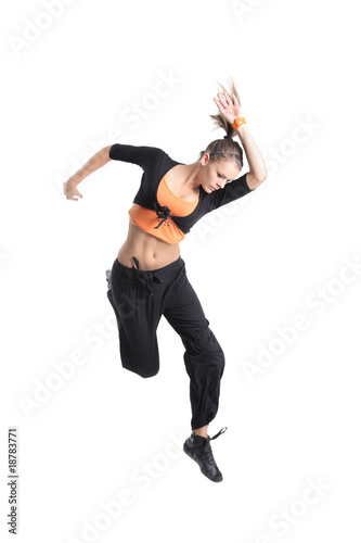 Attractive girl jumping in the air