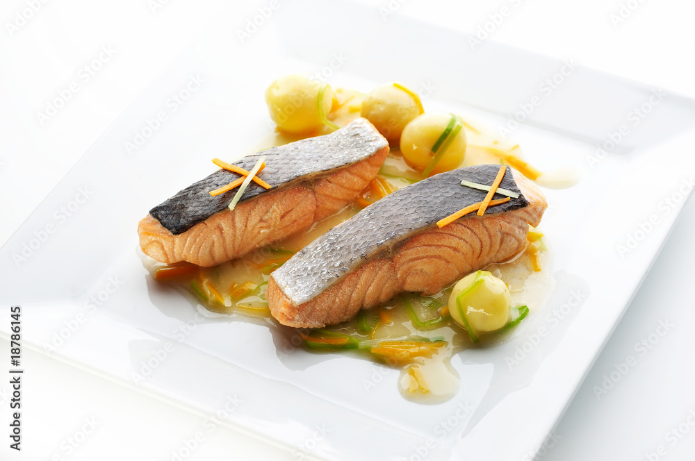 Grilled salmon steak with potato and different vegetables Grilled salmon steak with potato and different vegetables