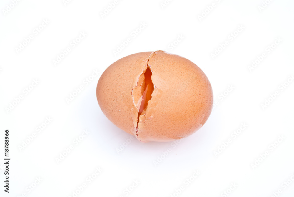 egg with breaking shell isolated on white background