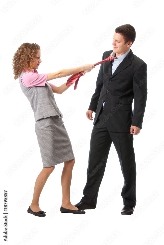 Girl pulls a man in a tie