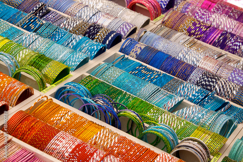 Colourful bangles on a market stall photo