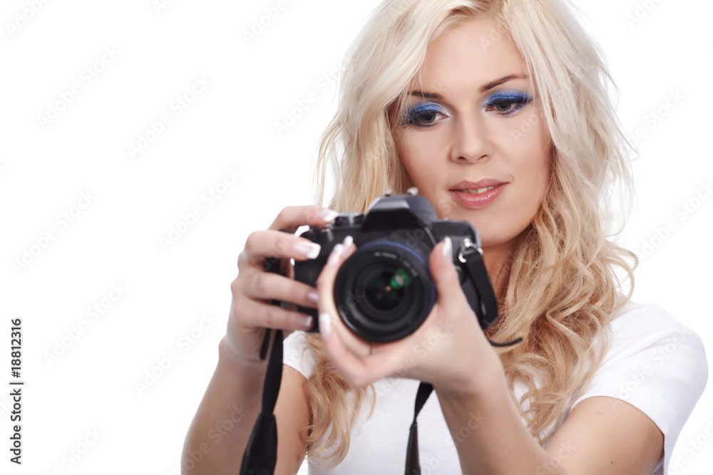 Beautiful smiling woman with digital camera. Isolated on white b Beautiful smiling woman with digital camera. Isolated on white b
