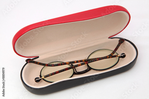 Eye glasses in a case isolated on white