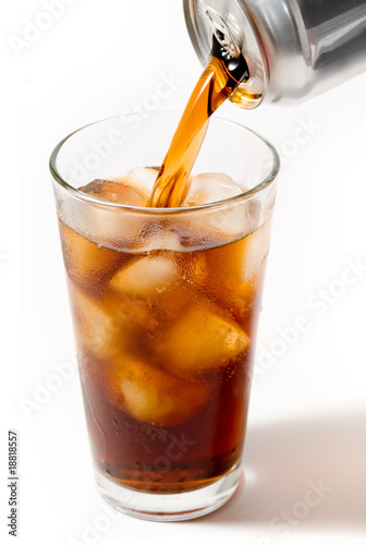 Soda pouring into a pint glass