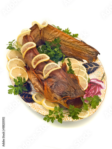 Catfish or sheatfish with lemon and parsley photo