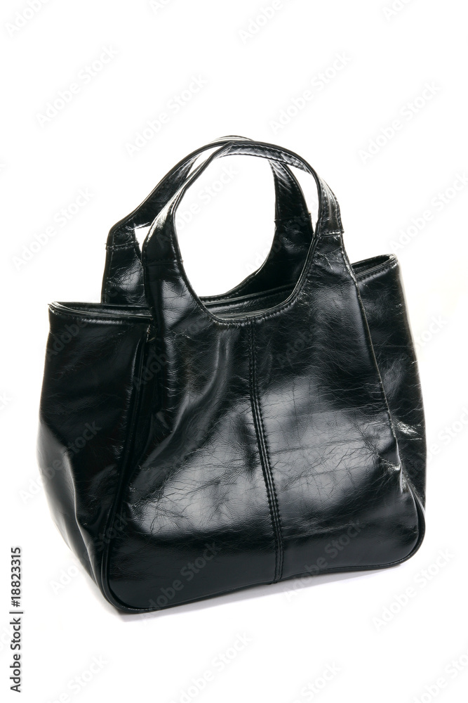 Black leather bag on a white background. Black leather bag on a white background.