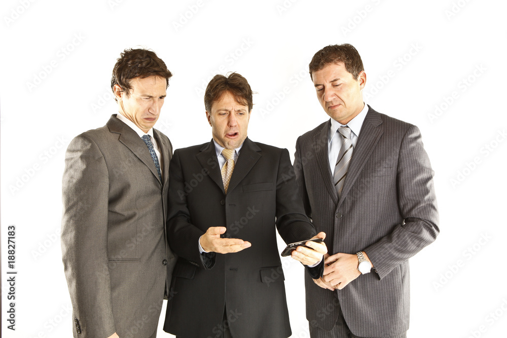 businessmen showing each other a telephone businessmen showing each other a telephone