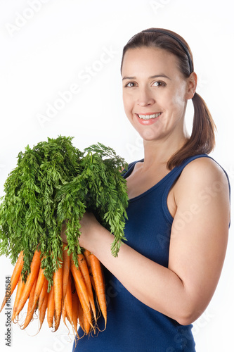 Girl with carrots photo