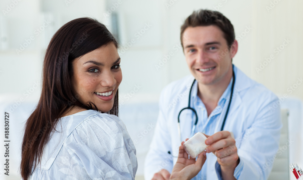 A doctor and his patient during a visit A doctor and his patient during a visit