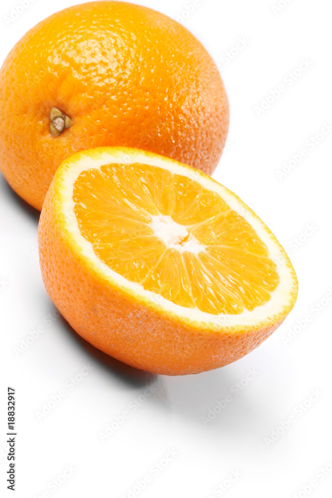 One and half oranges on the white background One and half oranges on the white background