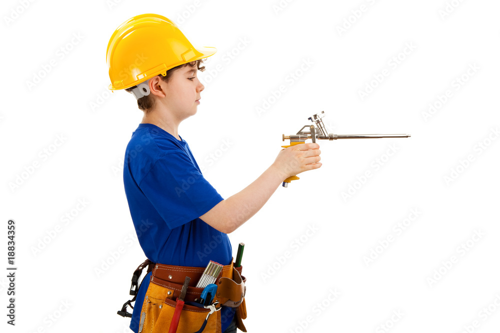 Kid as construction worker isolated on white background