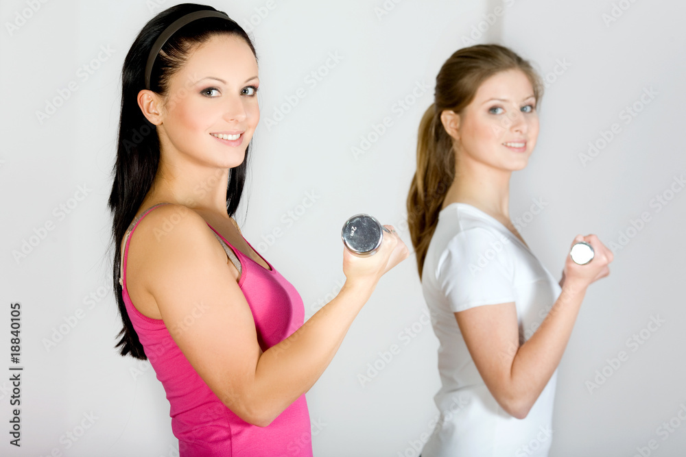 Woman doing fitness exercise Woman doing fitness exercise
