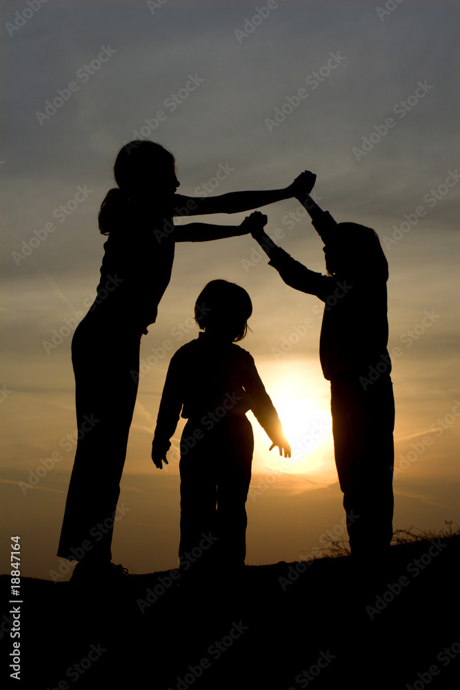 little girls - play in sunset